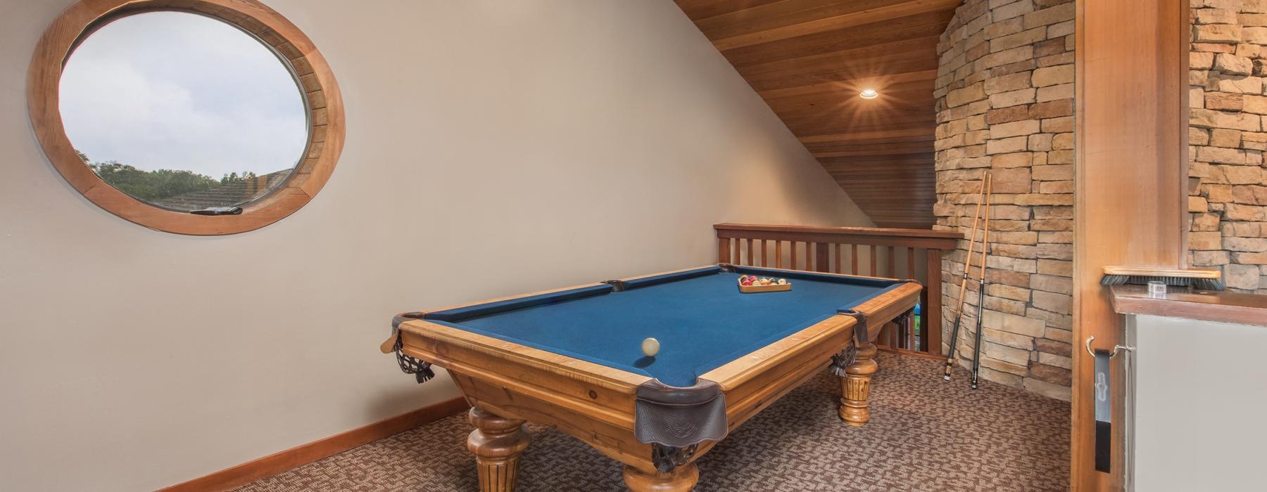 a pool table in a room